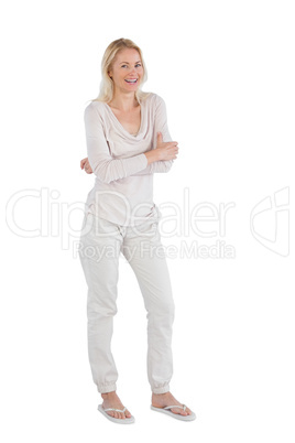 Cheerful woman with arms crossed