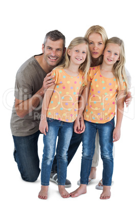 Happy family posing for the camera
