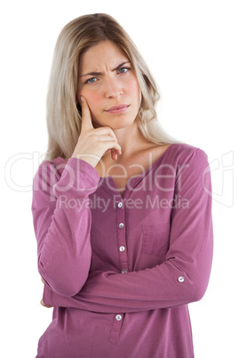 Troubled woman with hand on chin