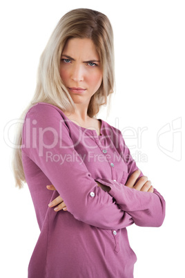 Mysterious woman with arms crossed