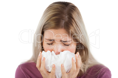 Sick woman with handkerchief on her hands