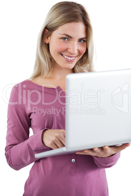 Woman with laptop looking at the camera