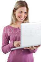 Woman with laptop looking at the camera