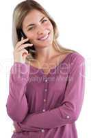 Smiling woman using mobile phone