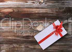 Gift box over wooden background