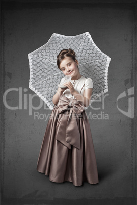 Girl in a luxurious dress with an umbrella