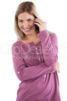 Cheerful woman having phone call