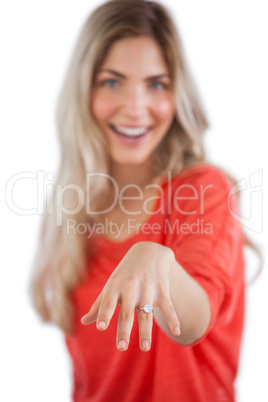 Young woman showing her engagement ring