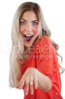 Excited woman showing her engagement ring