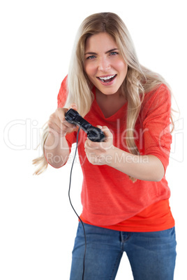 Cheerful woman holding video games joystick