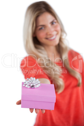 Young woman giving a gift
