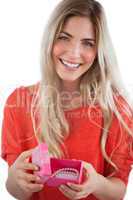 Smiling woman with gift box