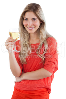 Woman holding white wine glass