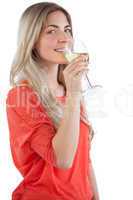 Smiling young woman with wine glass