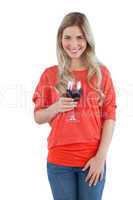 Blonde woman holding a wine glass