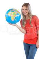 Woman presenting a globe