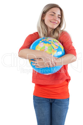 Woman embracing a globe