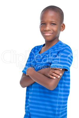Smiling boy with arms crossed