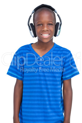 Smiling boy listening to music