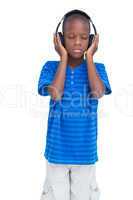 Boy listening to music with eyes closed
