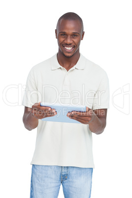 Happy man holding a tablet pc