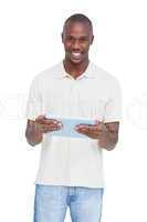 Happy man holding a tablet pc