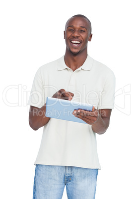 Laughing man using tablet pc