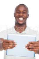 Tablet pc held by smiling man