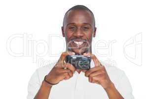 Happy man taking picture