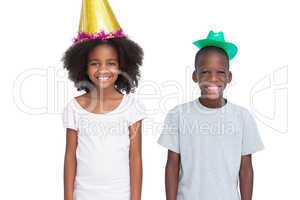 Kids wearing party hats