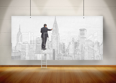 Businessman standing on ladder and drawing a city on a poster hu