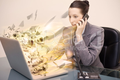 Laptop screen of a businesswoman exploding
