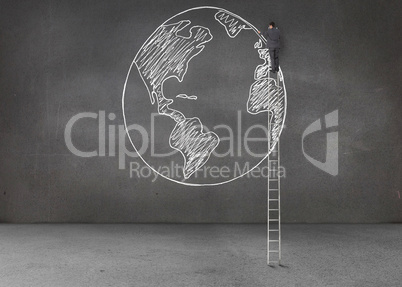 Businessman drawing earth with a chalk