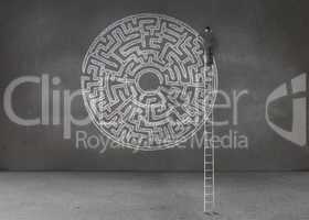 Businessman drawing a labyrinth