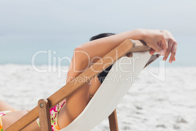 Woman resting on her deck chair