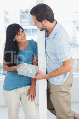 Man giving present to his girfriend