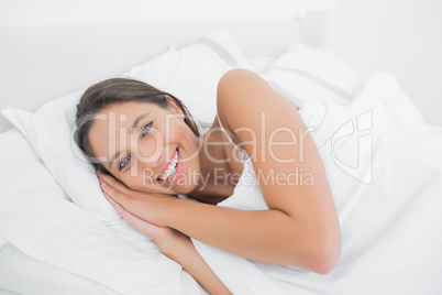 Beautiful woman resting in bed