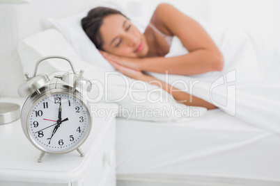 Woman sleeping deeply in bed