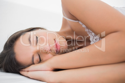 Woman lying in bed