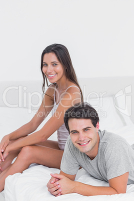 Portrait of a couple relaxing in bed
