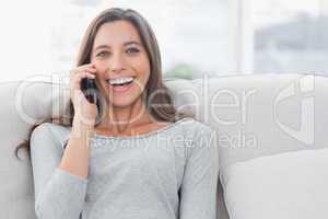Portrait of a woman having a phone conversation