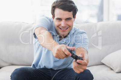 Portrait of a man playing video games