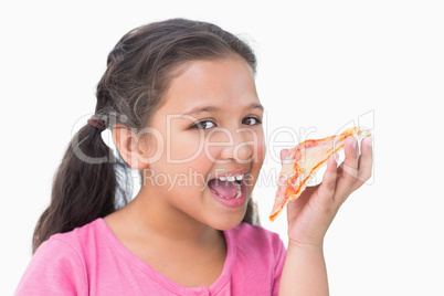 Little girl eating pizza