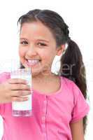Little girl drinking milk