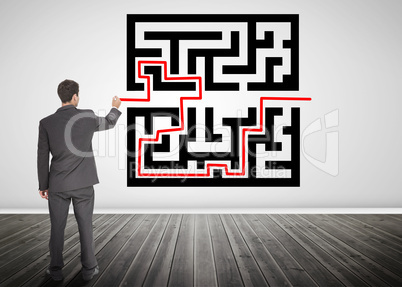Businessman drawing a red line through qr code