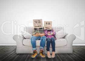 Couple wearing humorous boxes on their head