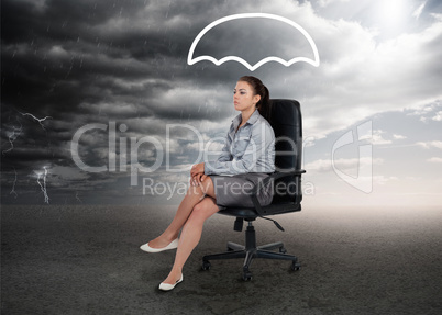 Umbrella graphic above the head of a businesswoman