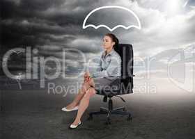 Umbrella graphic above the head of a businesswoman