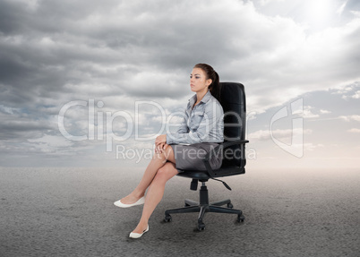 Attractive businesswoman sitting on a chair