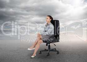 Attractive businesswoman sitting on a chair